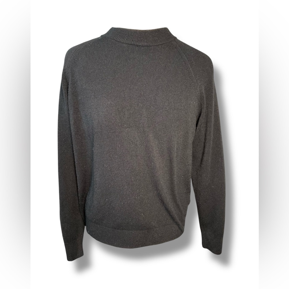 Classic black sweater with elegant back zipper